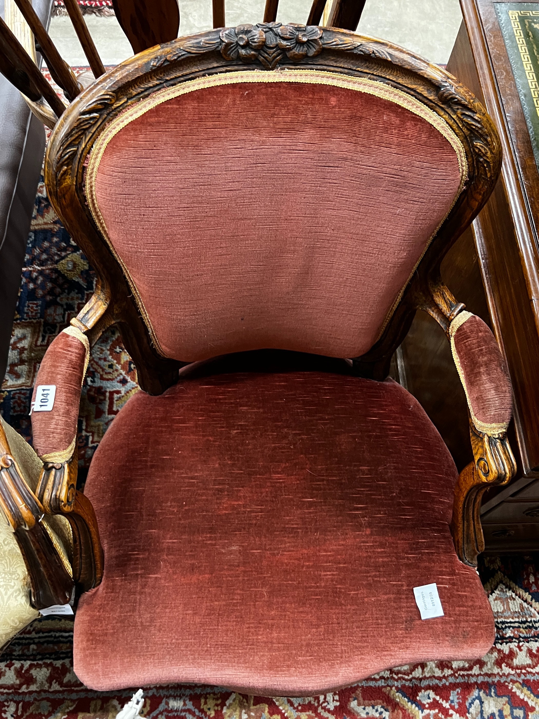 A late 19th century French upholstered oak fauteuil, width 68cm, depth 50cm, height 91cm